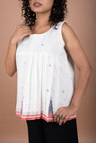 Minimalistic Sleeveless White Jamdani Cotton Top with Temple Border