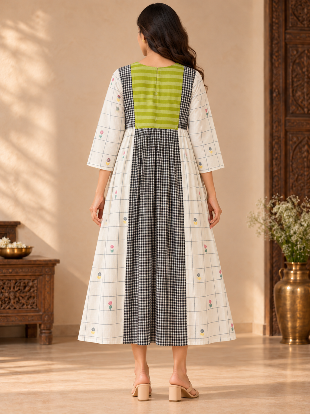 Green yoke Jamdani cotton midi dress with black and white checked centre panel, ivory grid-print sides and floral motifs.