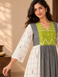 Green yoke Jamdani cotton midi dress with black and white checked centre panel, ivory grid-print sides and floral motifs.